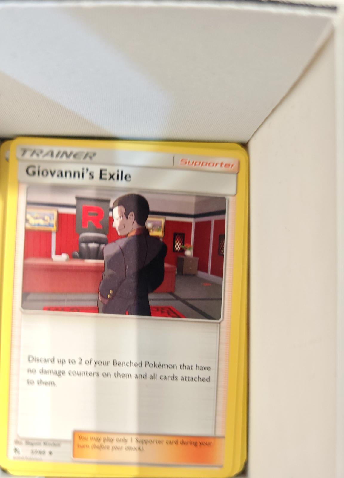 Giovanni's Exile - 174/214 - - UNBROKEN BONDS - Pokemon - Uncommon | AA70-45