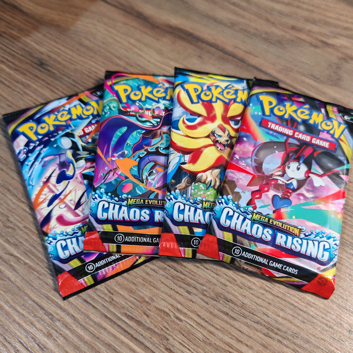Pokémon Trading Card Game (TCG): Mega Evolution Chaos Rising Set of 4 Booster Packs