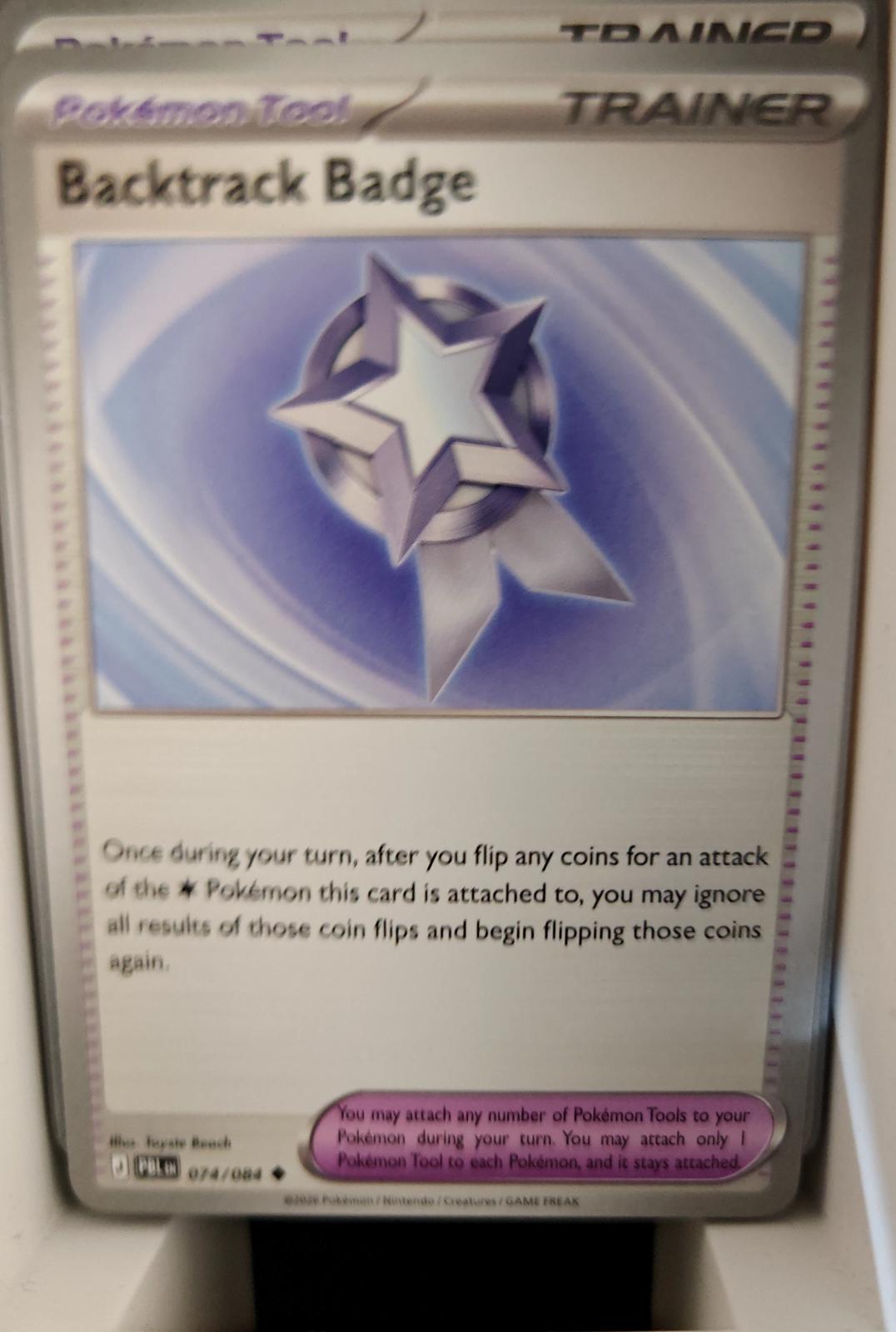 Backtrack Badge - 074/084 - - PITCH BLACK - Pokemon - Uncommon | AA25-96