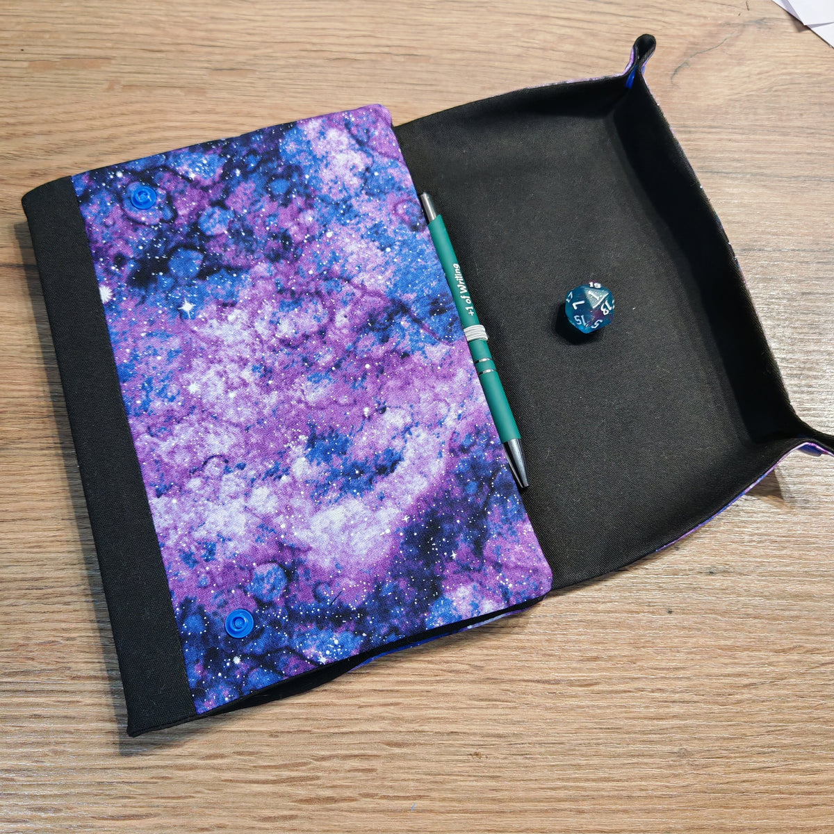 Purple Space A5 notebook with fold-out dice rolling tray
